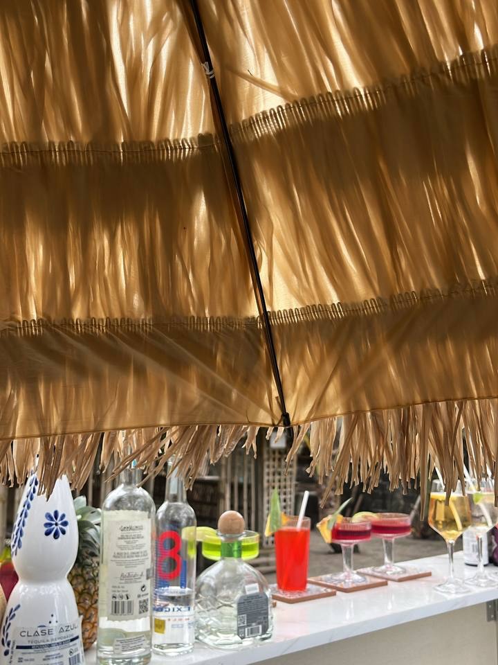 Thatched umbrella detail above the bar