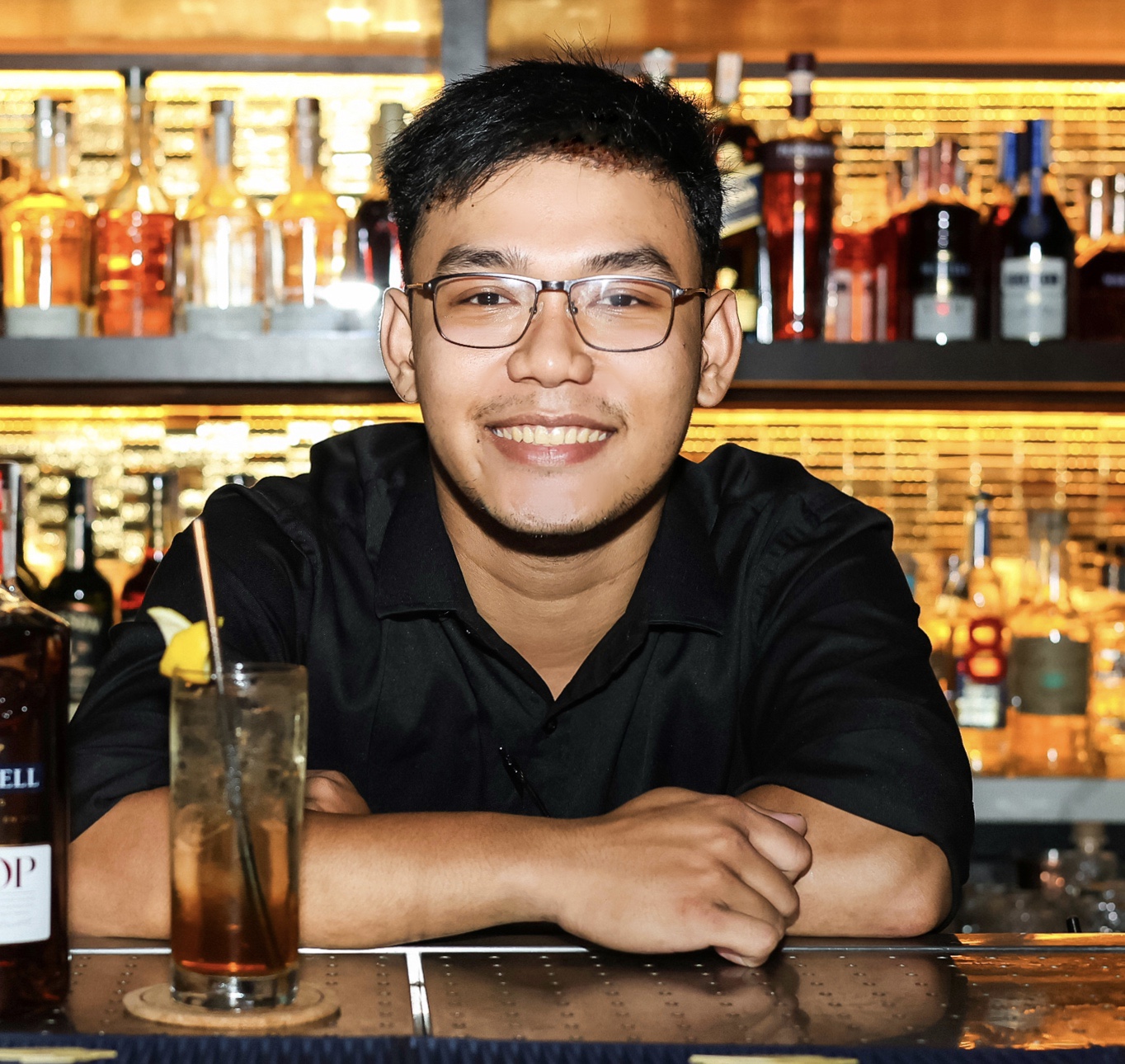 Rey behind the bar